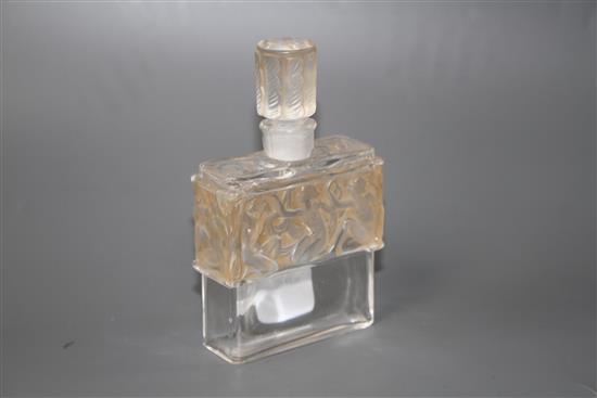 A Lalique for Molinard frosted glass scent bottle, decorated with a band of nudes, height 11.5cm